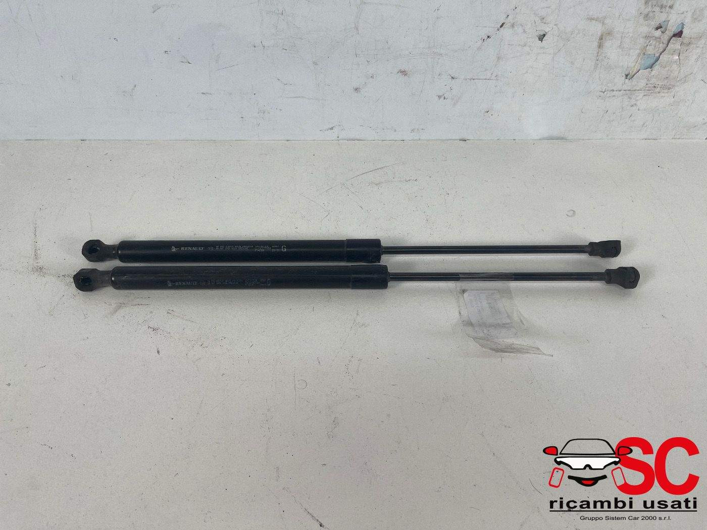 ATTUATORI SOLLEVAMENTO COFANO ANTERIORE DX E SX RENAULT Express Serie 654704121R (20>)